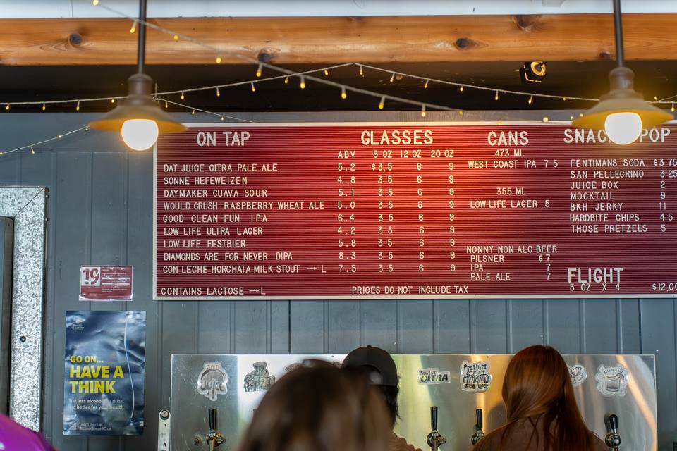 Taps and menu board at the taproom